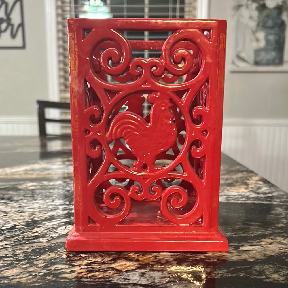 Kitchen utensil holder or candle holder.
